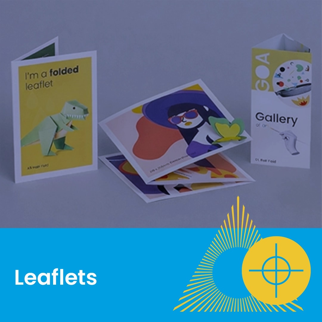 Three colourful, folded leaflets standing on a surface with "Leaflets" text below.