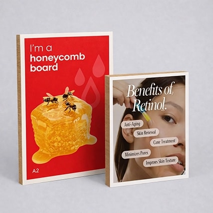 Two display boards: one with honeycomb and bees, one listing benefits of retinol on skin.