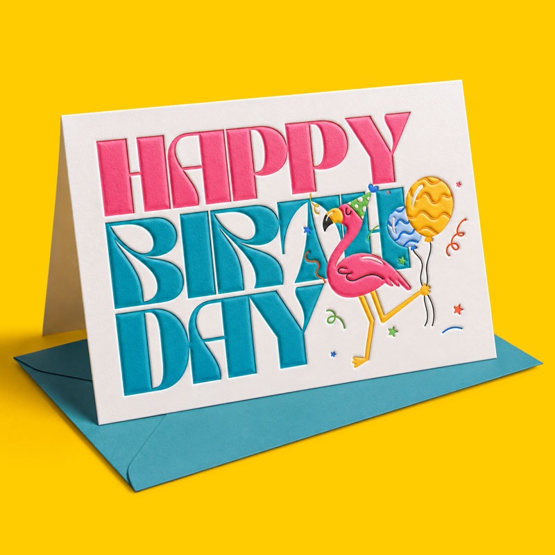 Embossed greeting card with "Happy Birthday," a flamingo, balloons, and confetti on a yellow background.