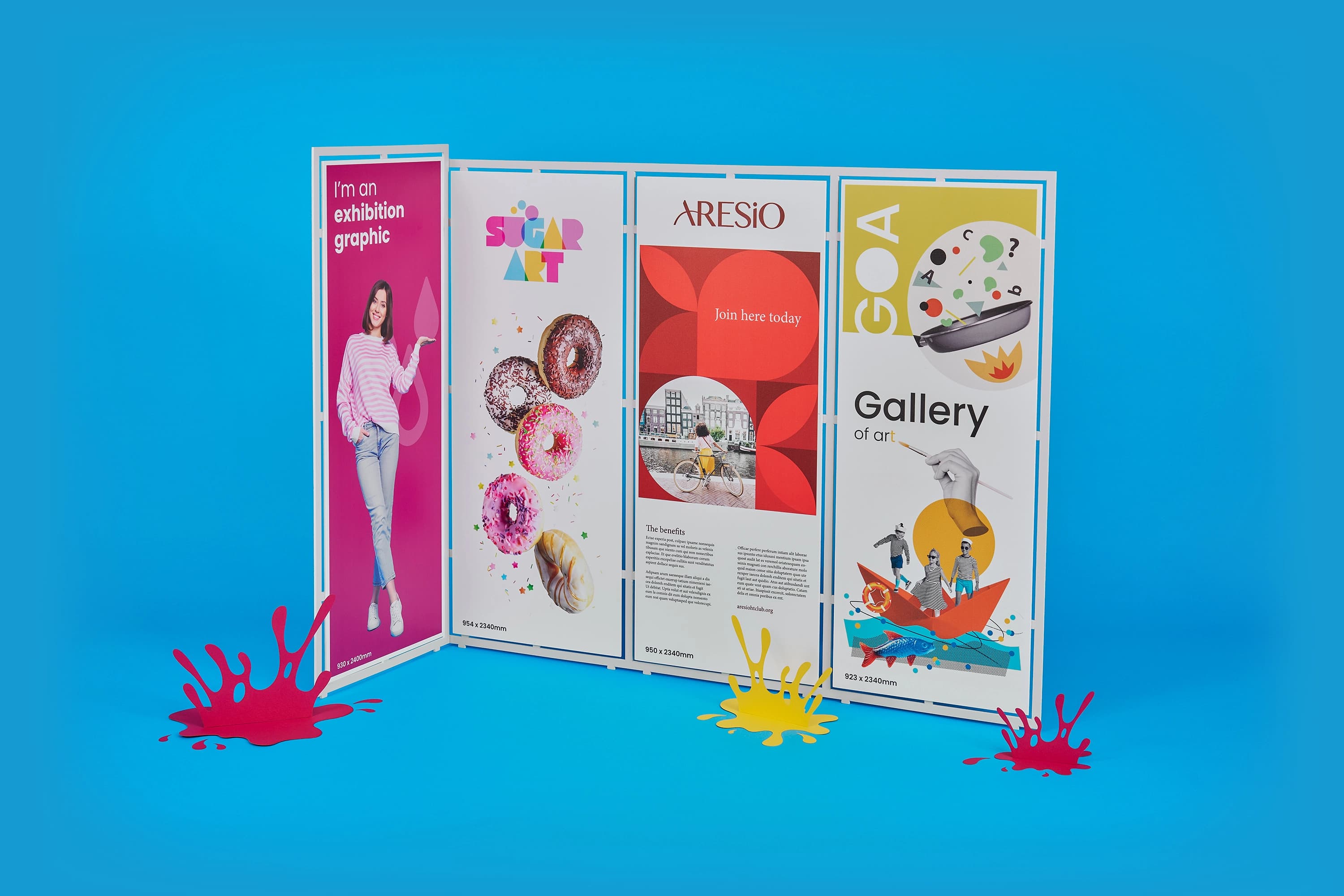 colourful exhibition panels with art and text against a blue background.